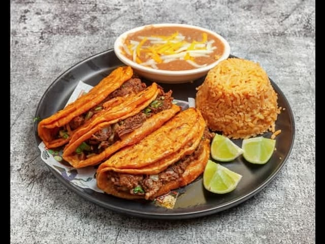2 Chicken Birria Tacos.